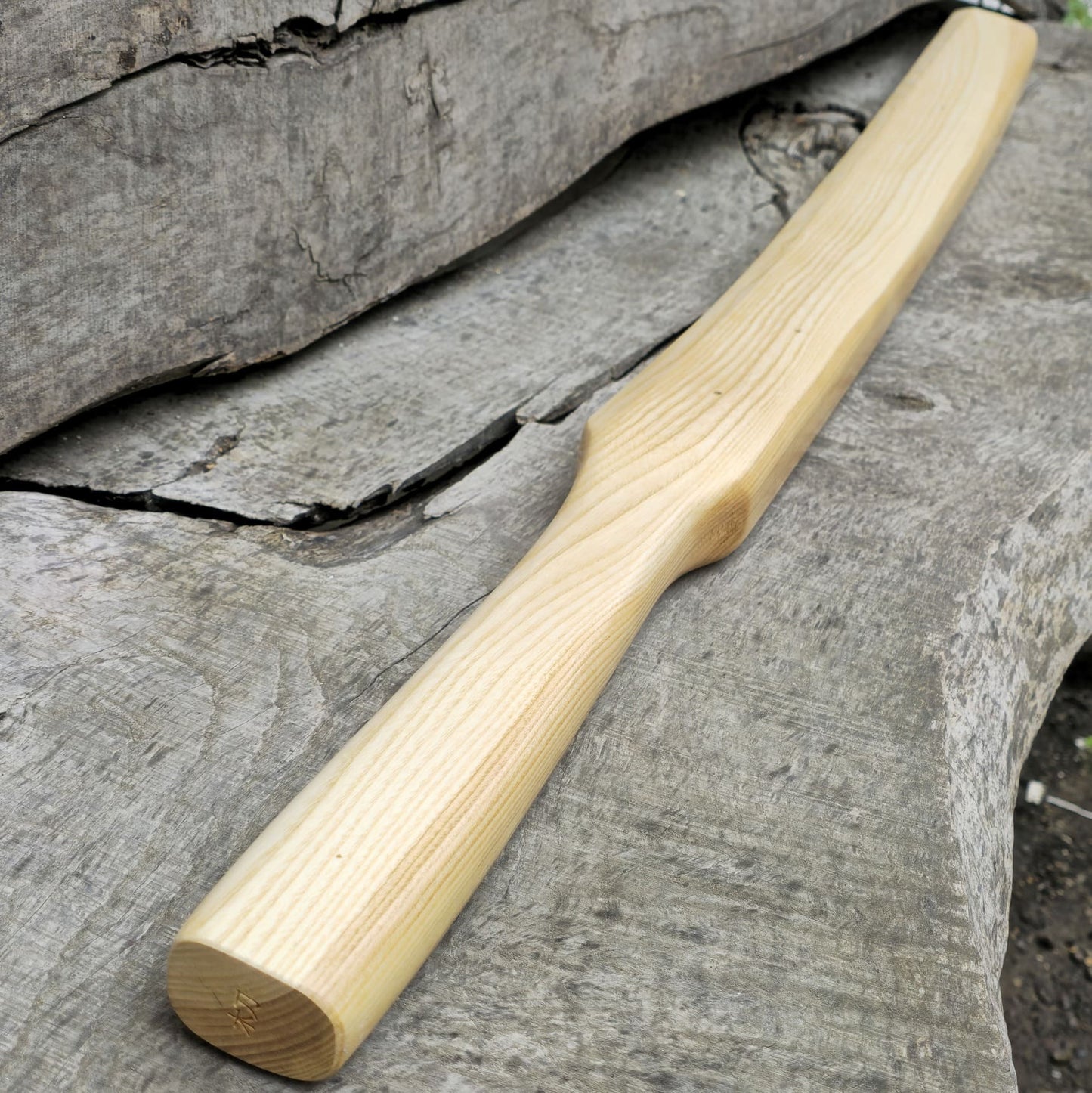 Heavy wooden suburito bokken for strength and technique training in kendo and aikido. Made from solid hardwood with a smooth, balanced design.