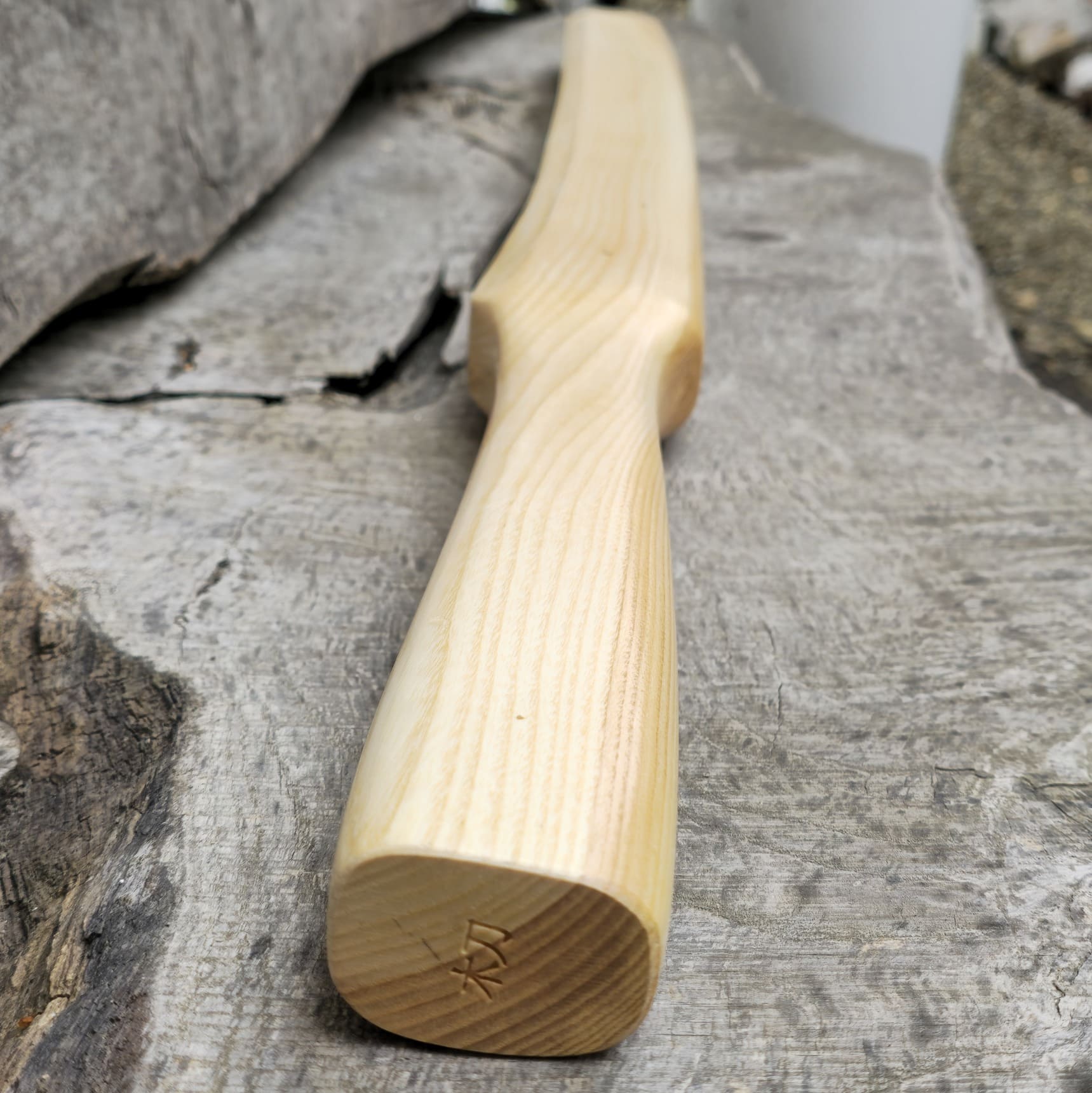 Heavy wooden suburito bokken for strength and technique training in kendo and aikido. Made from solid hardwood with a smooth, balanced design.