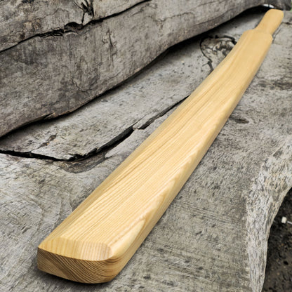 Heavy wooden suburito bokken for strength and technique training in kendo and aikido. Made from solid hardwood with a smooth, balanced design.