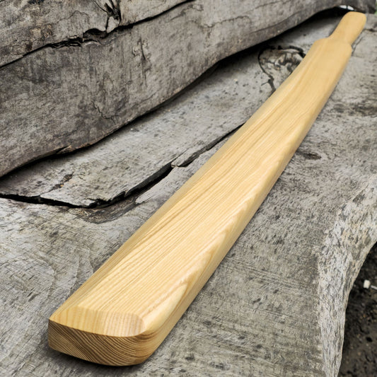 Heavy wooden suburito bokken for strength and technique training in kendo and aikido. Made from solid hardwood with a smooth, balanced design.