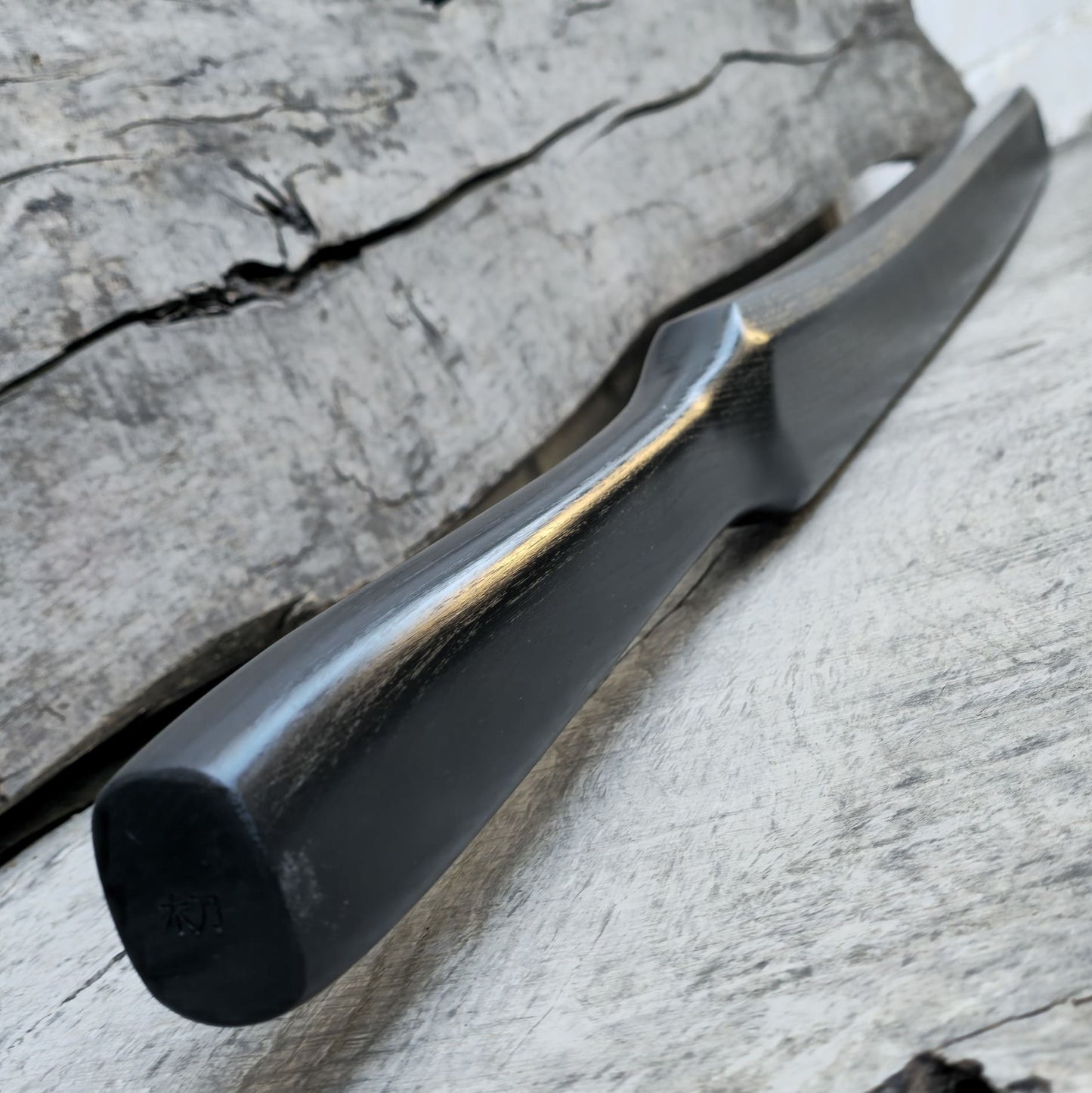 Heavy wooden suburito bokken for strength and technique training in kendo and aikido. Made from solid hardwood with a smooth, balanced design