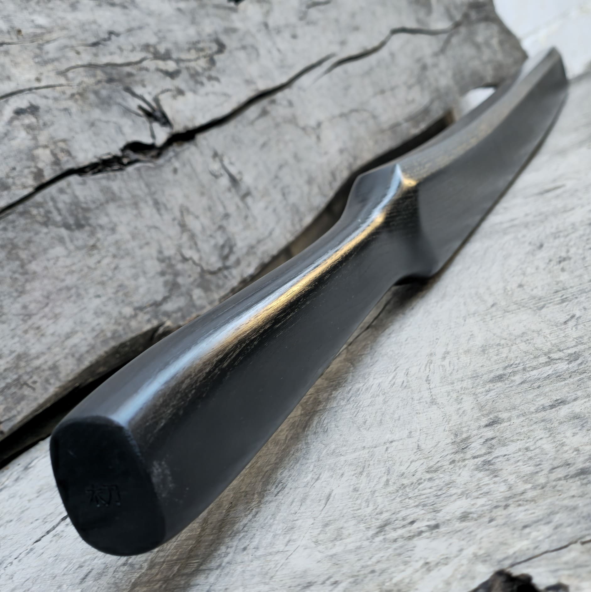 Heavy wooden suburito bokken for strength and technique training in kendo and aikido. Made from solid hardwood with a smooth, balanced design