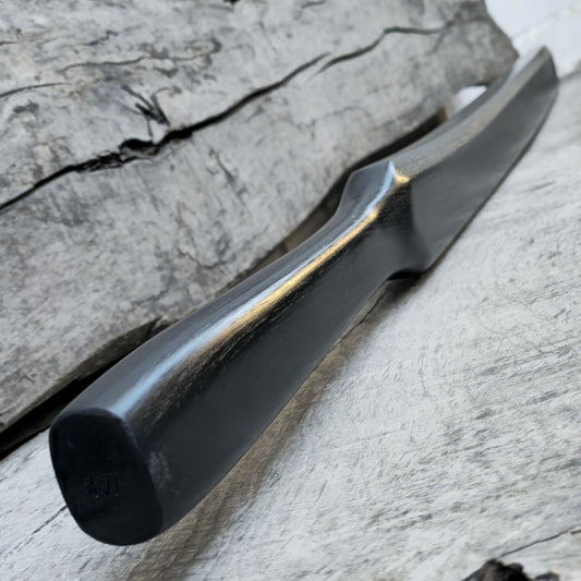 Heavy wooden suburito bokken for strength and technique training in kendo and aikido. Made from solid hardwood with a smooth, balanced design