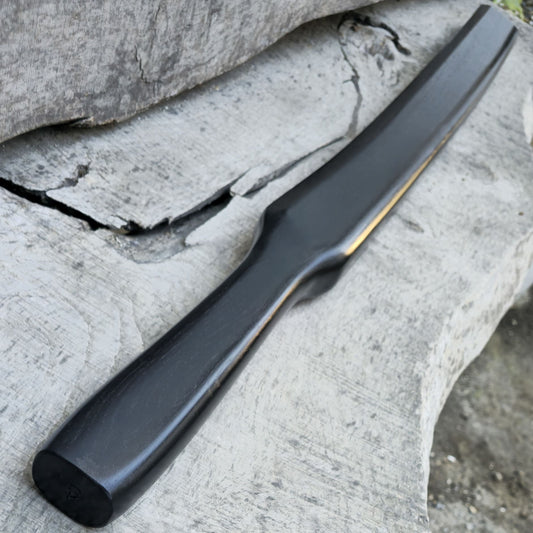Heavy wooden suburito bokken for strength and technique training in kendo and aikido. Made from solid hardwood with a smooth, balanced design