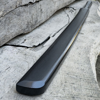 Heavy wooden suburito bokken for strength and technique training in kendo and aikido. Made from solid hardwood with a smooth, balanced design