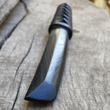 Wooden tanto for martial arts training, made of natural wood.