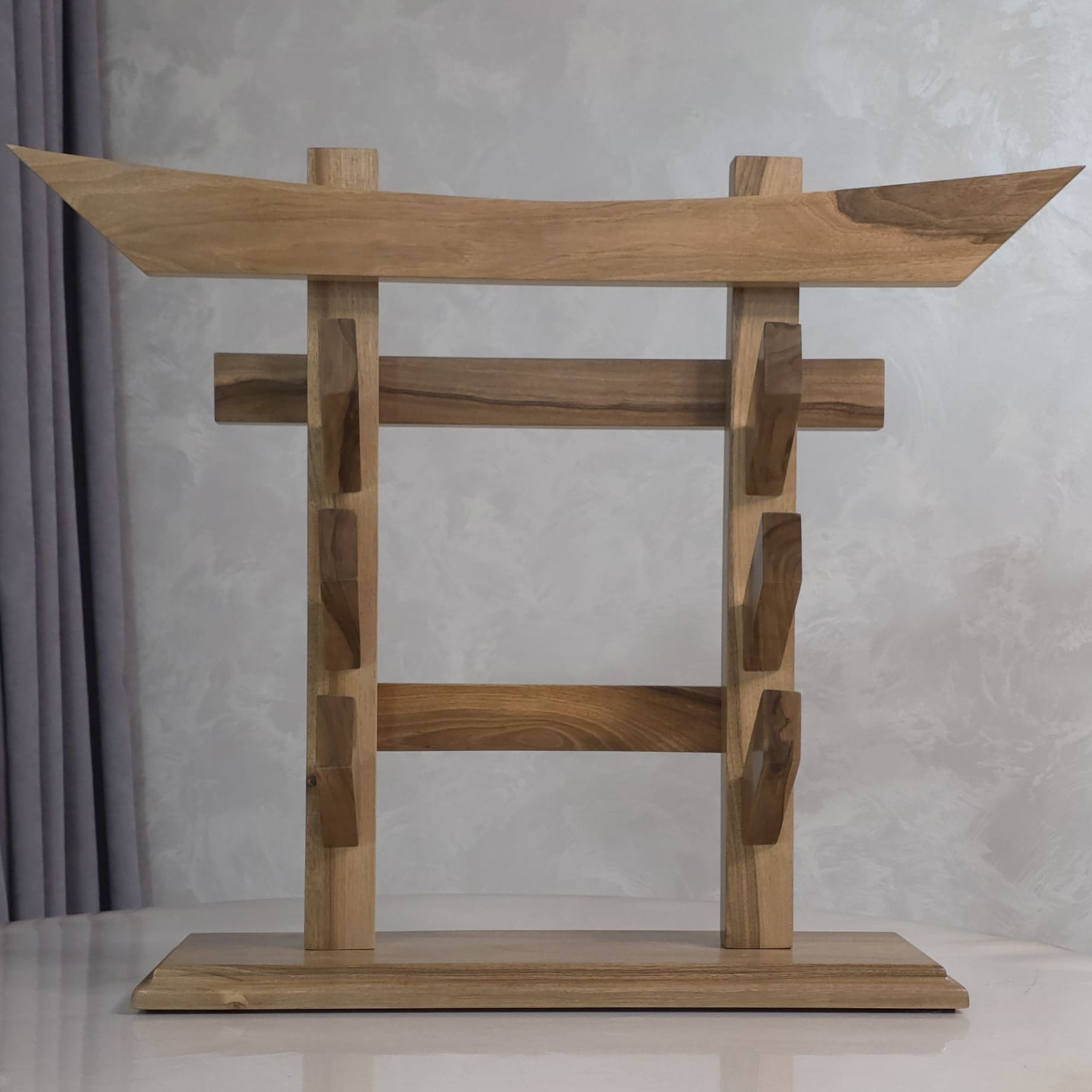 Traditional wooden sword rack for showcasing katanas and historical weapons