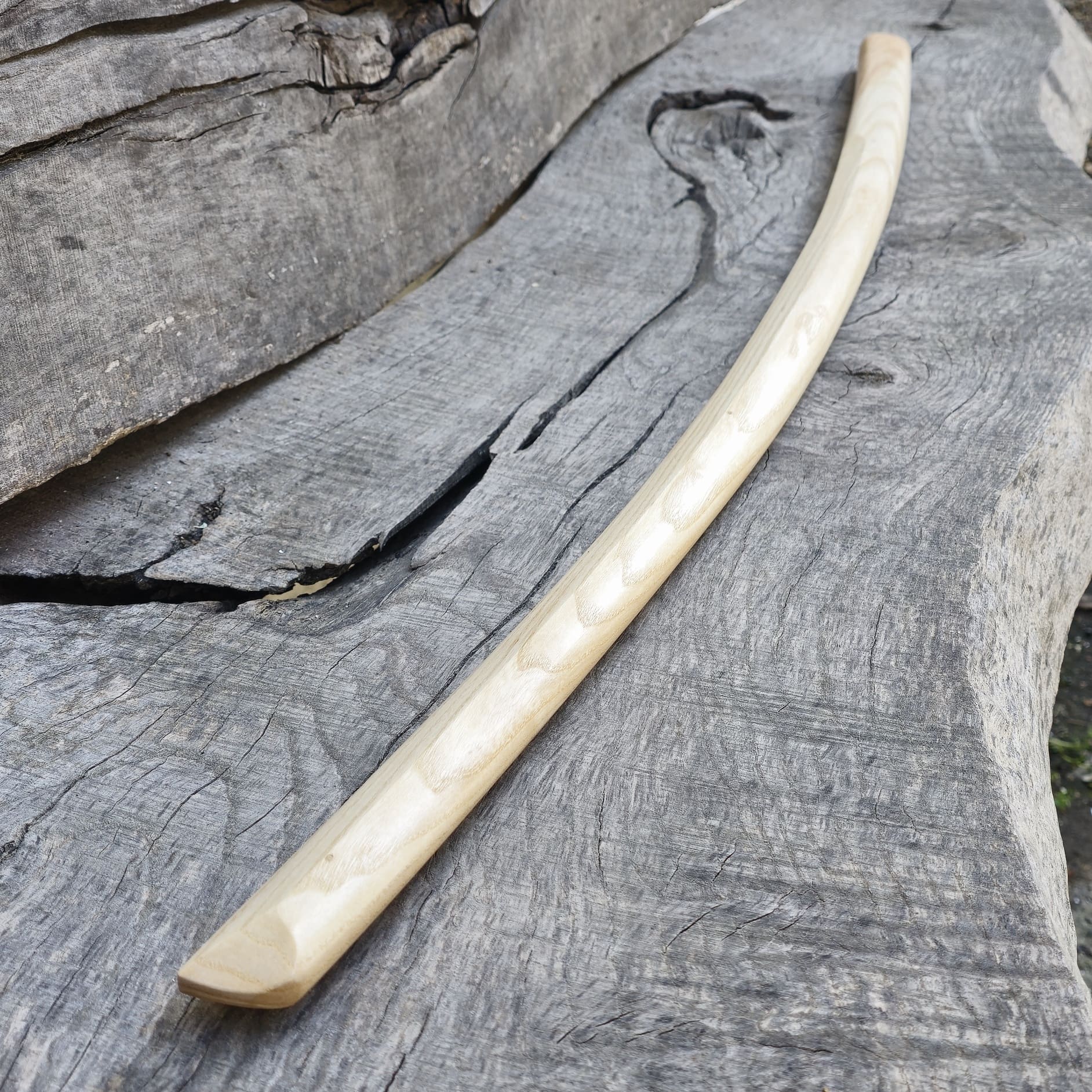 High-quality wooden bokken for martial arts training, crafted from durable wood with a smooth finish. Ideal for kendo, aikido, and samurai sword practice.