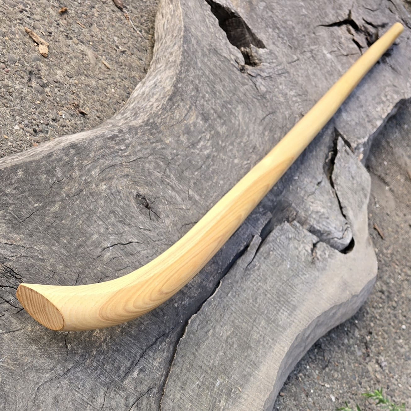 The training naginata is a wooden weapon made like a replica of Japanese edged weapons, Chinese Guandao or European glaive with a long shaft and a long blade extending to the point.