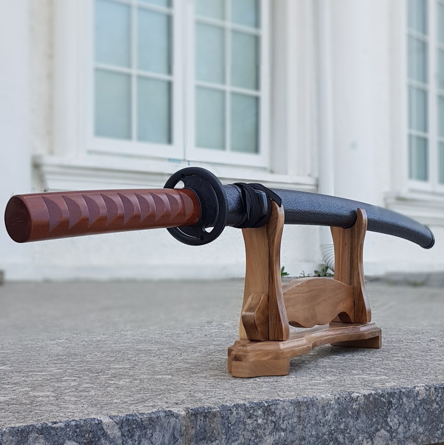 Elegant wooden stand for sword display – ideal for collectors and martial artists