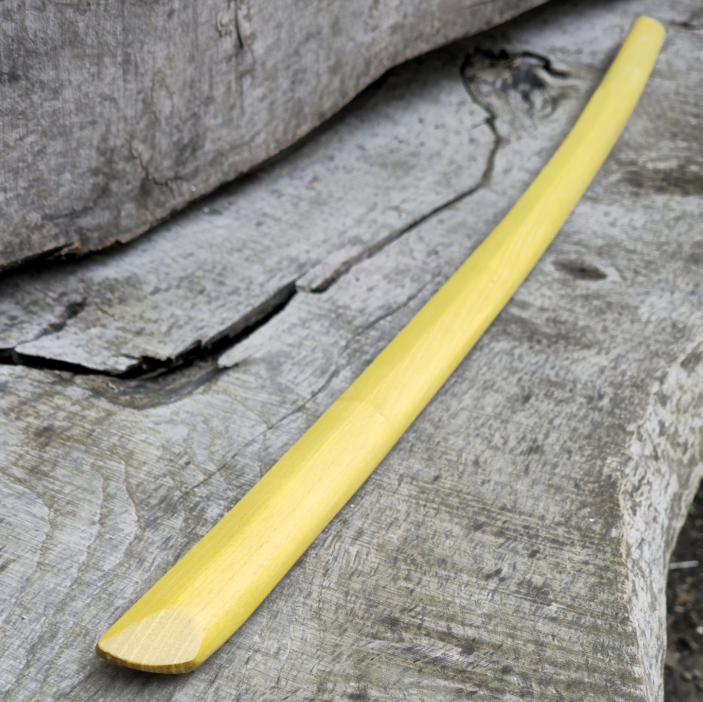High-quality wooden bokken for martial arts training, crafted from durable wood with a smooth finish. Ideal for kendo, aikido, and samurai sword practice