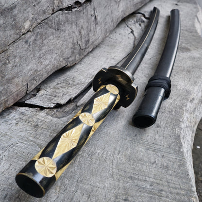Premium wooden bokken for martial arts training, designed for kendo, aikido, and samurai practice. Durable wood with a smooth finish for optimal handling