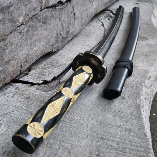 Premium wooden bokken for martial arts training, designed for kendo, aikido, and samurai practice. Durable wood with a smooth finish for optimal handling