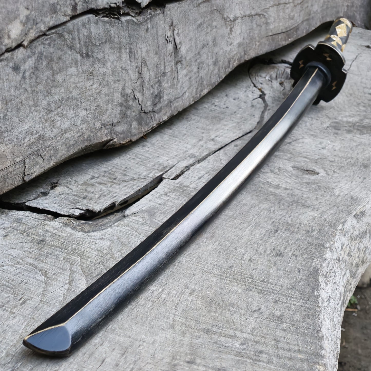 Premium wooden bokken for martial arts training, designed for kendo, aikido, and samurai practice. Durable wood with a smooth finish for optimal handling
