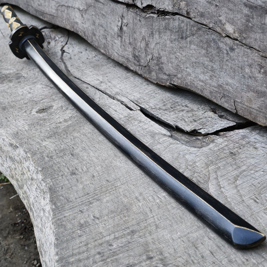 Premium wooden bokken for martial arts training, designed for kendo, aikido, and samurai practice. Durable wood with a smooth finish for optimal handling
