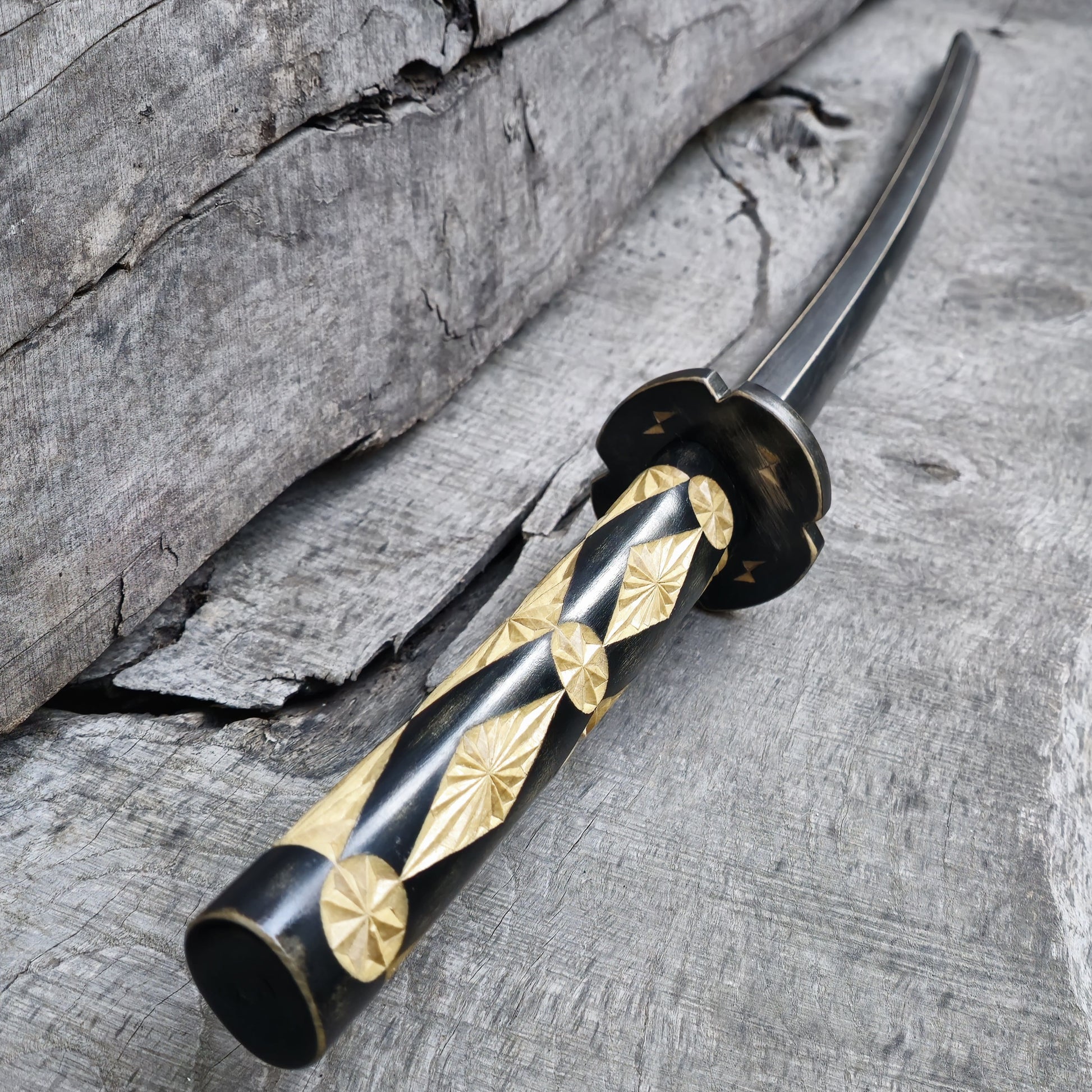 Premium wooden bokken for martial arts training, designed for kendo, aikido, and samurai practice. Durable wood with a smooth finish for optimal handling