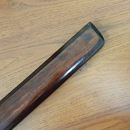 Heavy wooden suburito bokken for strength and technique training in kendo and aikido. Made from solid hardwood with a smooth, balanced design
