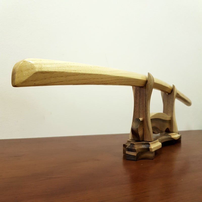 High-quality wooden bokken for martial arts training, crafted from durable wood with a smooth finish. Ideal for kendo, aikido, and samurai sword practice.