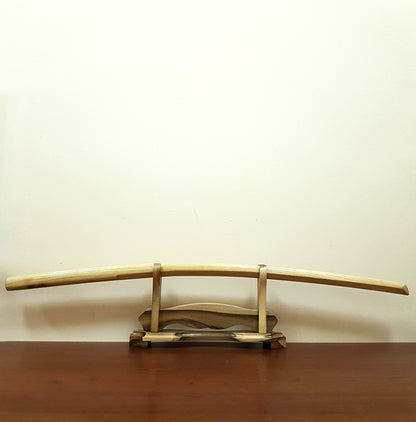 High-quality wooden bokken for martial arts training, crafted from durable wood with a smooth finish. Ideal for kendo, aikido, and samurai sword practice.