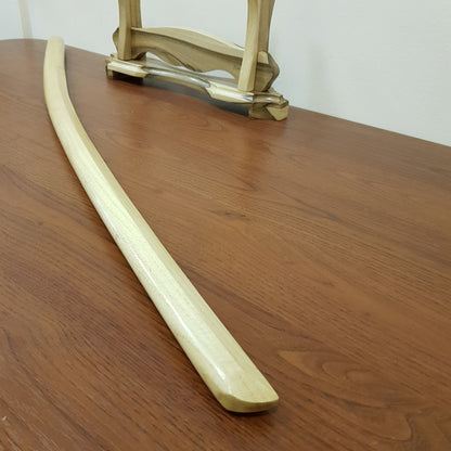 High-quality wooden bokken for martial arts training, crafted from durable wood with a smooth finish. Ideal for kendo, aikido, and samurai sword practice.