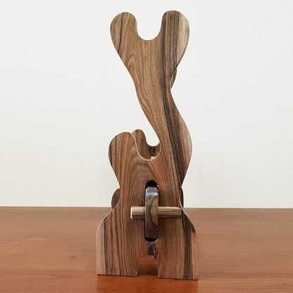 Traditional wooden sword rack for showcasing katanas and historical weapons.