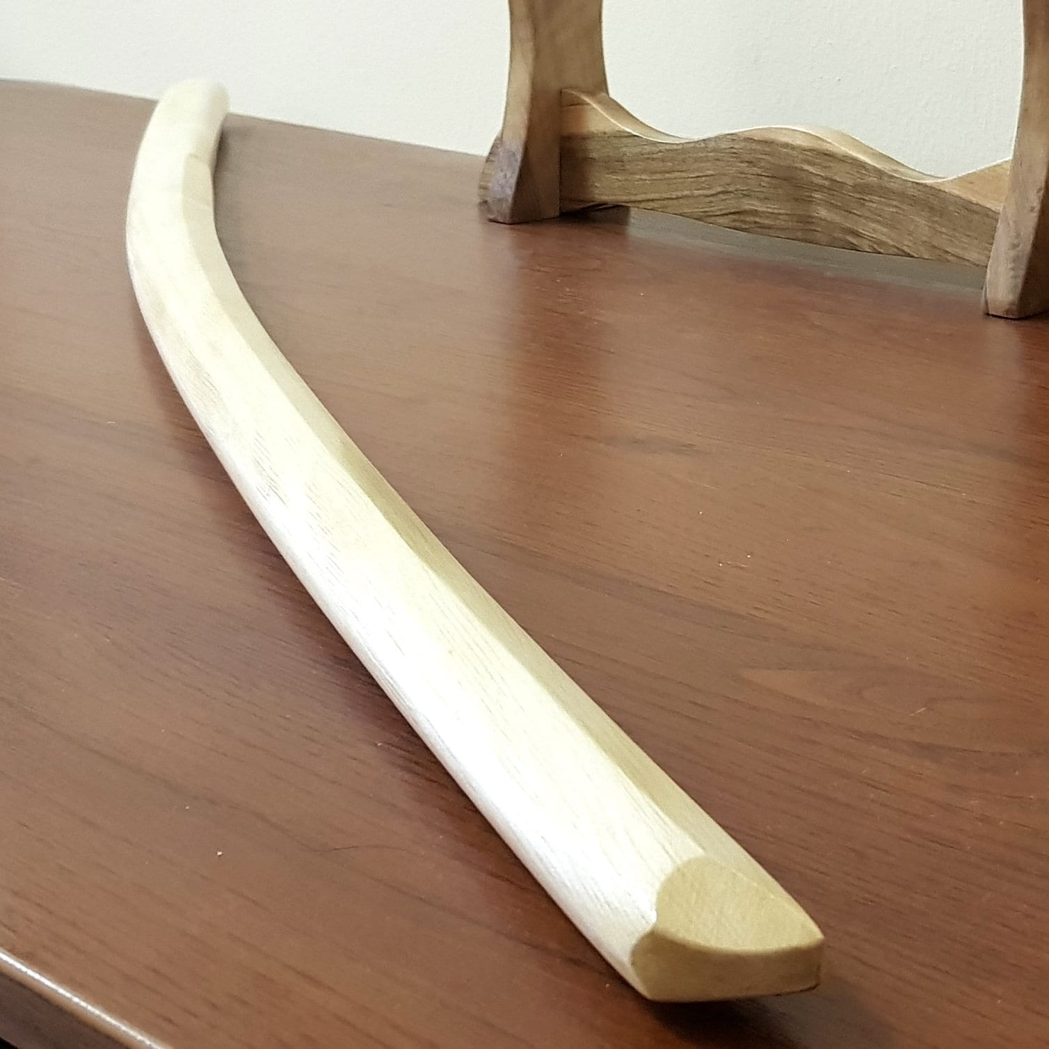 High-quality wooden bokken for martial arts training, crafted from durable wood with a smooth finish. Ideal for kendo, aikido, and samurai sword practice.