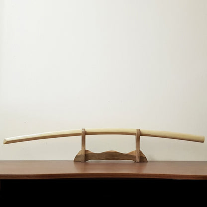 High-quality wooden bokken for martial arts training, crafted from durable wood with a smooth finish. Ideal for kendo, aikido, and samurai sword practice.